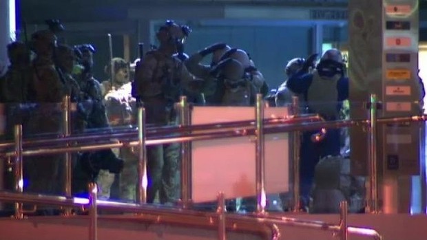 Soldiers fine tune their G20 preparations in Brisbane's CBD on Sunday night. Photo: Nine News
Soldiers fine tune their G20 preparations in Brisbane's CBD on Sunday night. Photo: Nine News