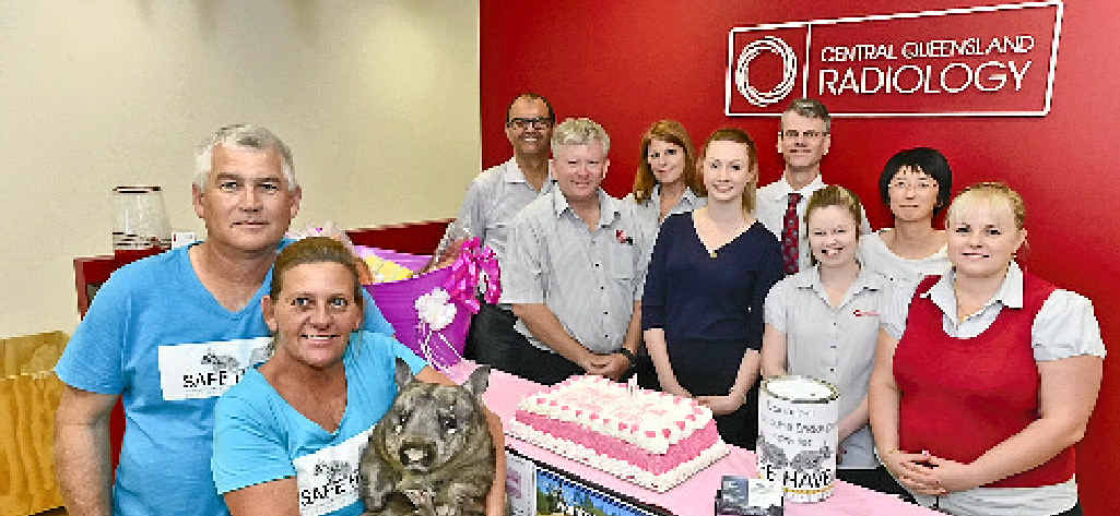 CELEBRATING RUBY: Safe Haven Wombat Breeding Centre members Peter Brooks and Tina Janssen, with Ruby, and CQ Radiology staff. CELEBRATING RUBY: Safe Haven Wombat Breeding Centre members Peter Brooks and Tina Janssen, with Ruby, and CQ Radiology staff.