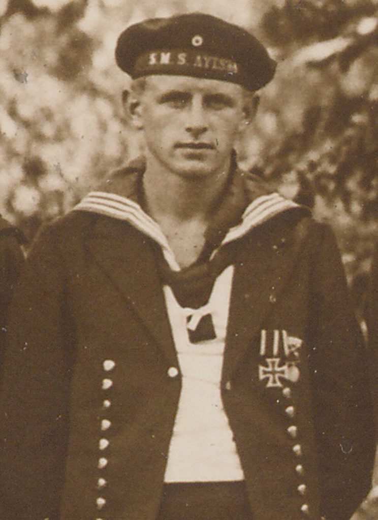 A German sailor from the Emden raiding party that later seized the Ayesha. The sailors considered their new ship a German naval vessel, which is why they wore hatbands saying SMS Ayesha. A German sailor from the Emden raiding party that later seized the Ayesha. The sailors considered their new ship a German naval vessel, which is why they wore hatbands saying SMS Ayesha.