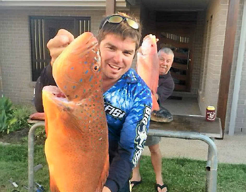 Adam Balkin is photo bombed by Cappo while showing off his solid trout. Adam Balkin is photo bombed by Cappo while showing off his solid trout.