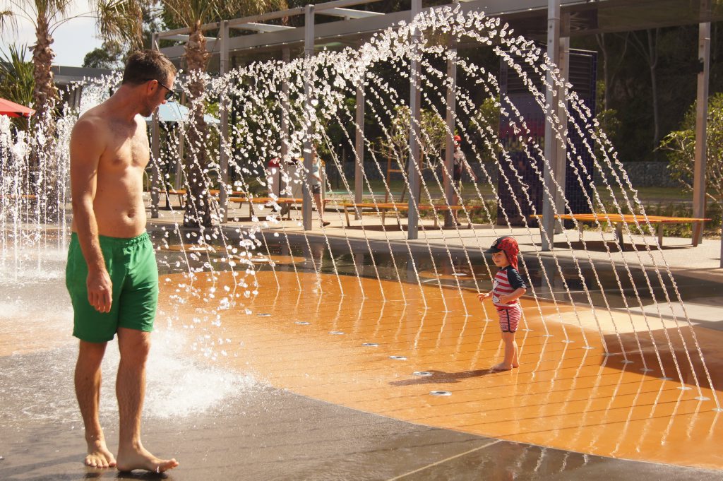 Joey, 18 months, was the first to jump in the water play area (with dad Daniel Green) at the new East Shores development. Joey, 18 months, was the first to jump in the water play area (with dad Daniel Green) at the new East Shores development.