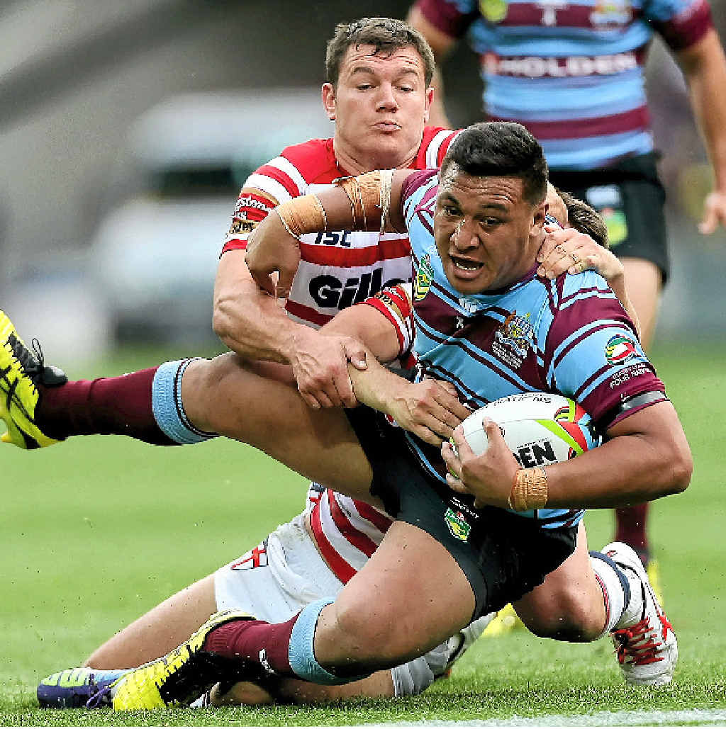 Josh Papalii is tackled during the Four Nations match between Australian and England at AAMI Park last week. Josh Papalii is tackled during the Four Nations match between Australian and England at AAMI Park last week.