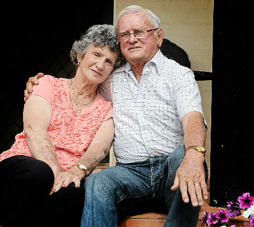 GETTING ON WITH LIFE: Neville Rogan lends wife Margaret a helping hand in her fight against cancer. GETTING ON WITH LIFE: Neville Rogan lends wife Margaret a helping hand in her fight against cancer.