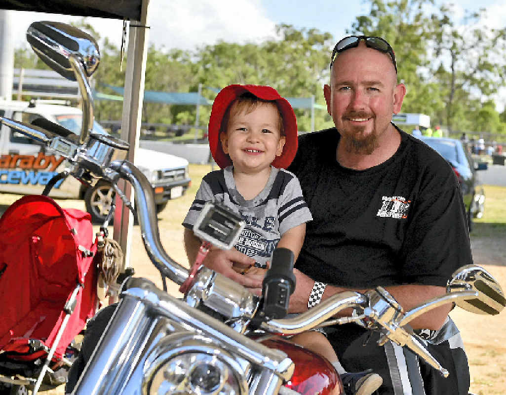 Brett Alloway with his son Seth enjoying the All-Bike meet at Benaraby Raceway. Brett Alloway with his son Seth enjoying the All-Bike meet at Benaraby Raceway.