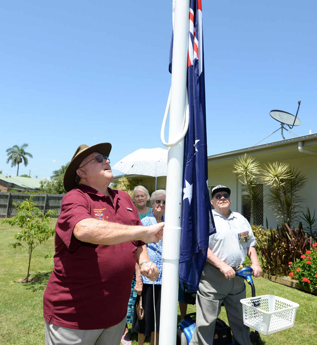Ted Tomkins raises a flag given to residents of the Settlers Lifestyle Village by local MP Bill Byrne. Ted Tomkins raises a flag given to residents of the Settlers Lifestyle Village by local MP Bill Byrne.