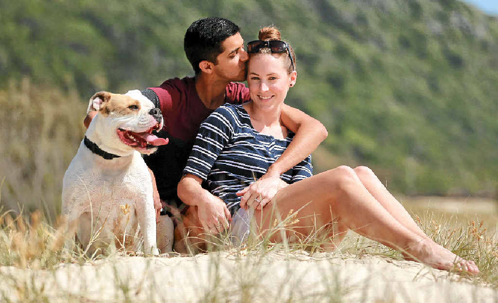 BRAVE: Nadine White, who is battling brain cancer, with her fiance Travis Meyn and dog Norman at Tallebudgera. BRAVE: Nadine White, who is battling brain cancer, with her fiance Travis Meyn and dog Norman at Tallebudgera.
