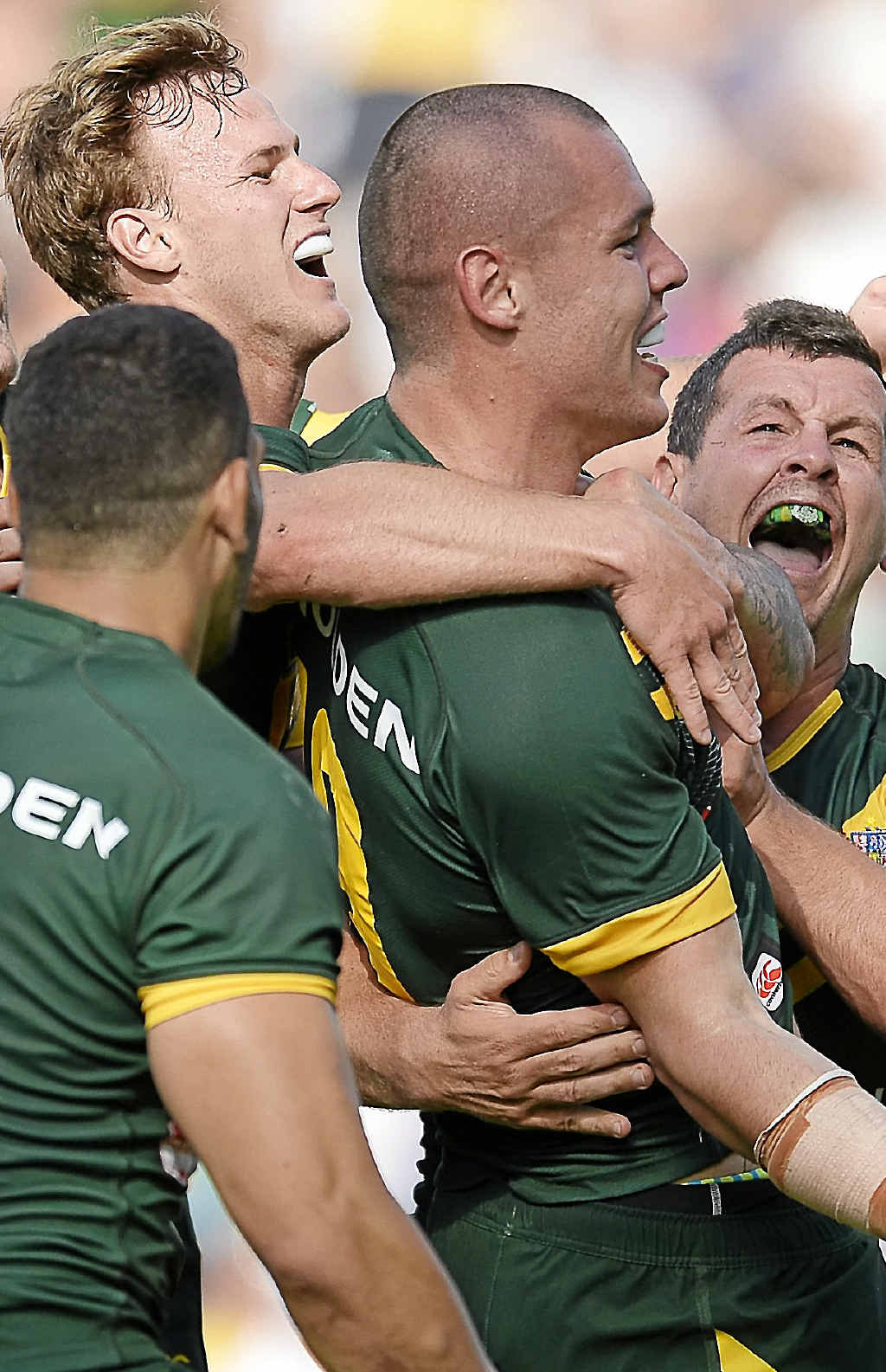 GOOD TIMES: David Klemmer celebrates scoring a try against Samoa with teammates. GOOD TIMES: David Klemmer celebrates scoring a try against Samoa with teammates.