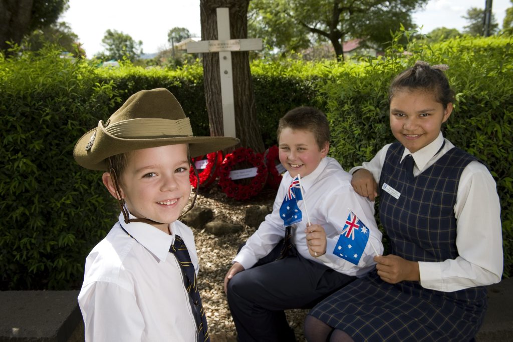 Holy Name Primary School students (from left) Tyson Borey, Cameron Melano and Tremae Jacks in the school's remembrance garden ahead of Anzac Day. Tyson wears an authentic 25th Battalion second world war slouch hat borrowed from the Milne Bay Military Museum, Tuesday, April 22, 2014. Photo Kevin Farmer / The Chronicle Holy Name Primary School students (from left) Tyson Borey, Cameron Melano and Tremae Jacks in the school's remembrance garden ahead of Anzac Day. Tyson wears an authentic 25th Battalion second world war slouch hat borrowed from the Milne Bay Military Museum, Tuesday, April 22, 2014. Photo Kevin Farmer / The Chronicle