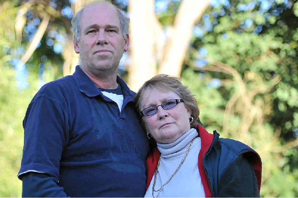 SAD LOSS: Brett and Bonnie Scovell are distraught after the death of their 21-year-old son Sean (below right) at his workplace. SAD LOSS: Brett and Bonnie Scovell are distraught after the death of their 21-year-old son Sean (below right) at his workplace.