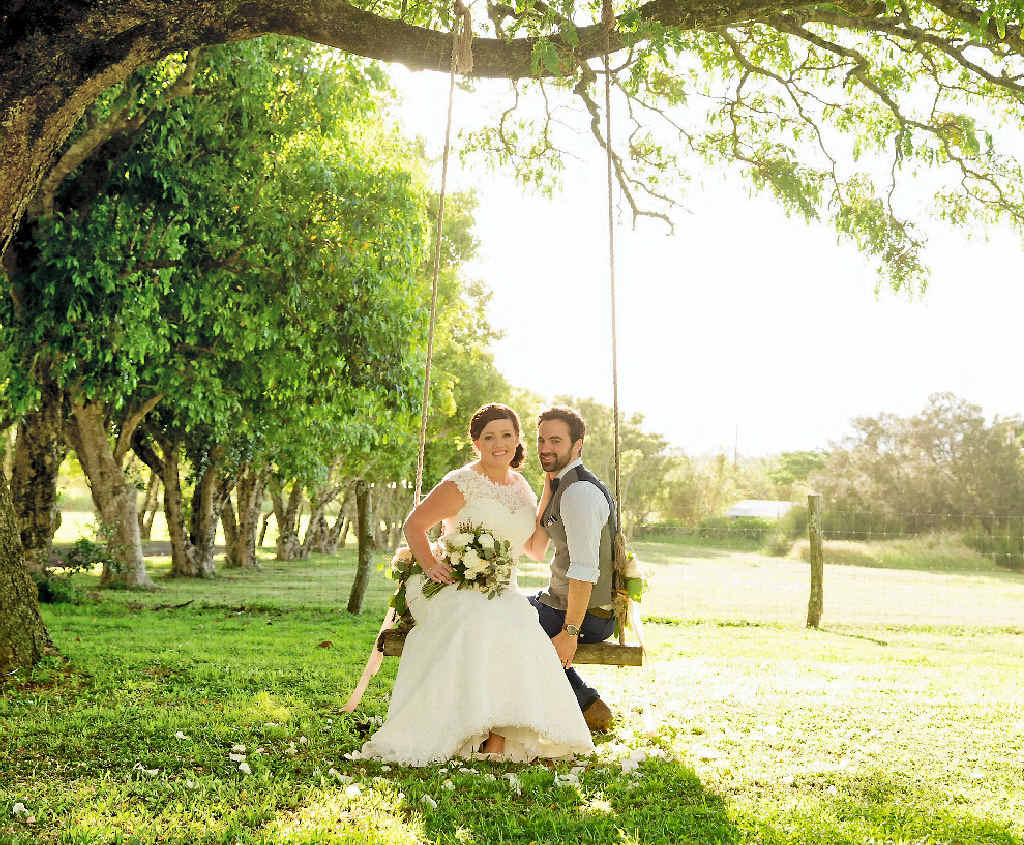 HAPPY DAY: Carl and Janelle Jensen got into the island swing during their wedding. HAPPY DAY: Carl and Janelle Jensen got into the island swing during their wedding.