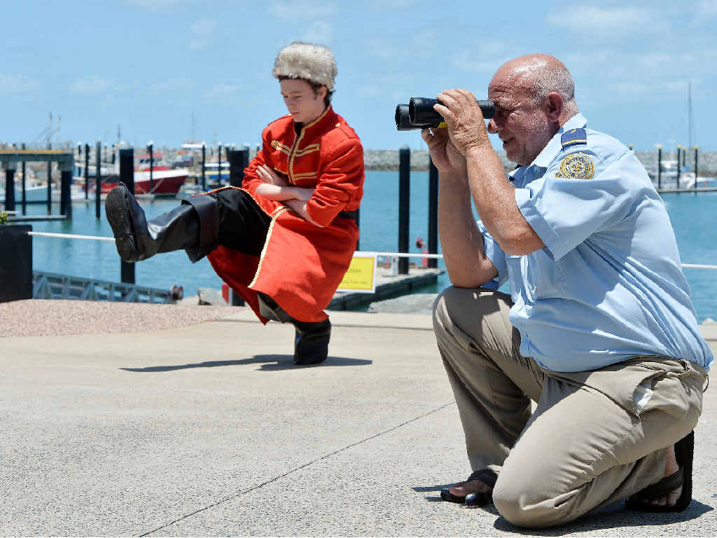 READY: VMR radio operator Mick Selwood (VMR) and Sails Sports Bar apprentice chef Rory Jackson, wearing a costume from DIY Party Supplies, are ready if the Russians make a surprise visit to Mackay Harbour.