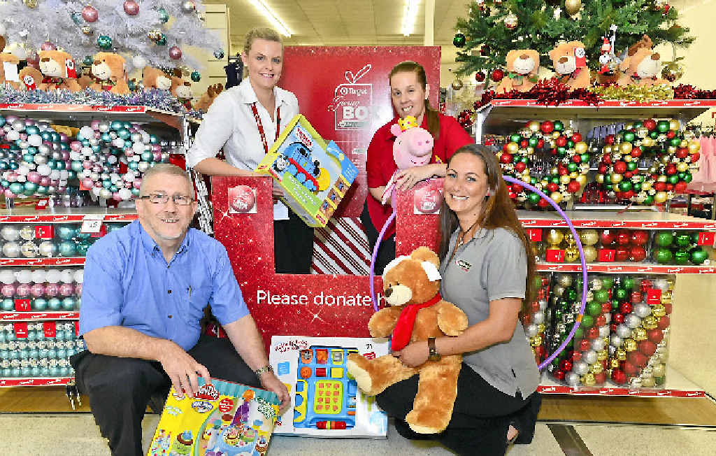CAN YOU HELP?: Uniting Church’s Rev Allan Smith, Target store manager Emily Brien, employee Caitlin Akers and UnitingCare’s Tracy Bocos. CAN YOU HELP?: Uniting Church’s Rev Allan Smith, Target store manager Emily Brien, employee Caitlin Akers and UnitingCare’s Tracy Bocos.
