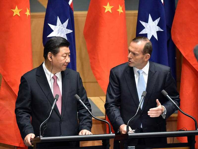 China's President Xi Jinping (L) and Australia's Prime Minister Tony Abbott (R) make statements to the media following the signing of a free trade agreement at Parliament House in Canberra on November 17, 2014. Xi is visiting Canberra after attending the G20 Summit in Brisbane over the weekend. China's President Xi Jinping (L) and Australia's Prime Minister Tony Abbott (R) make statements to the media following the signing of a free trade agreement at Parliament House in Canberra on November 17, 2014. Xi is visiting Canberra after attending the G20 Summit in Brisbane over the weekend.