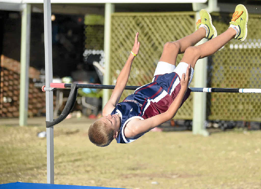 OVER: Warwick West student Ben Lyons clears a jump in practice before the nationals in Penguin, Tasmania. OVER: Warwick West student Ben Lyons clears a jump in practice before the nationals in Penguin, Tasmania.