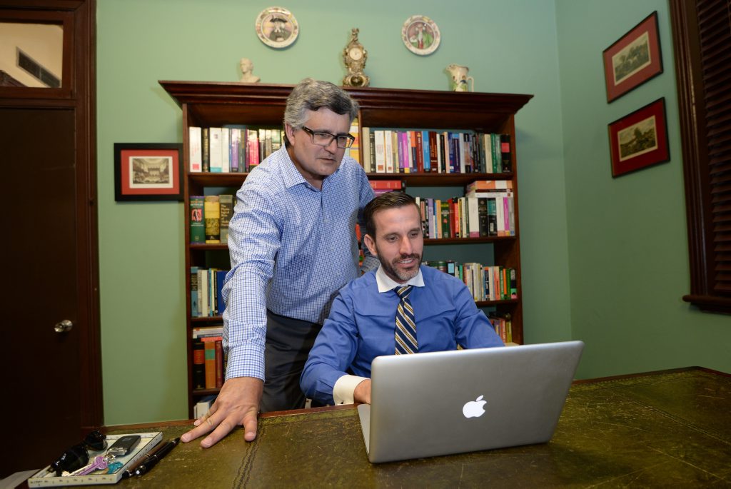 Barristers Ross Lo Monaco and Jordan Ahlstrand search for photos taken in the old Rockhampton Supreme Court building showing Barristers Ross Lo Monaco and Jordan Ahlstrand search for photos taken in the old Rockhampton Supreme Court building showing