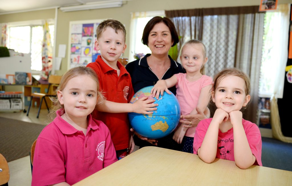 Patrice Payne, Angus Stewart, Director of Rockhampton South Kindergarten Julia Greene, Hannah Davis and Mia Hogan look at Japan on the world map. Photo Allan Reinikka / The Morning Bulletin