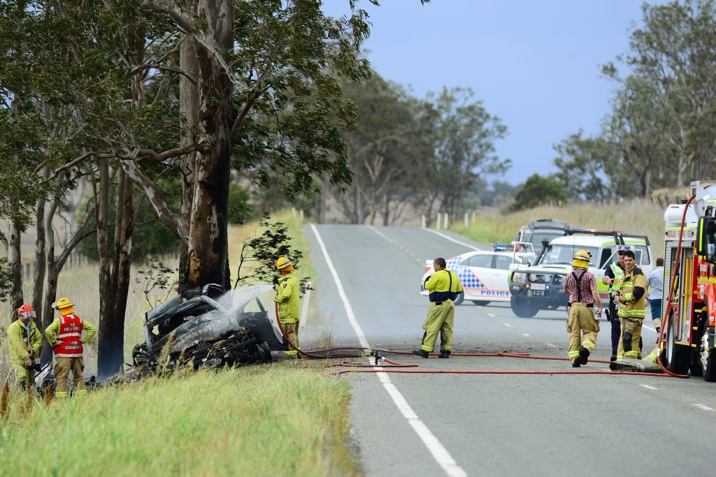 Emergency crews at the scene of a single vehicle accident on Ipswich Boonah Road at Milbong. Photo: David Nielsen / The Queensland Times Emergency crews at the scene of a single vehicle accident on Ipswich Boonah Road at Milbong. Photo: David Nielsen / The Queensland Times