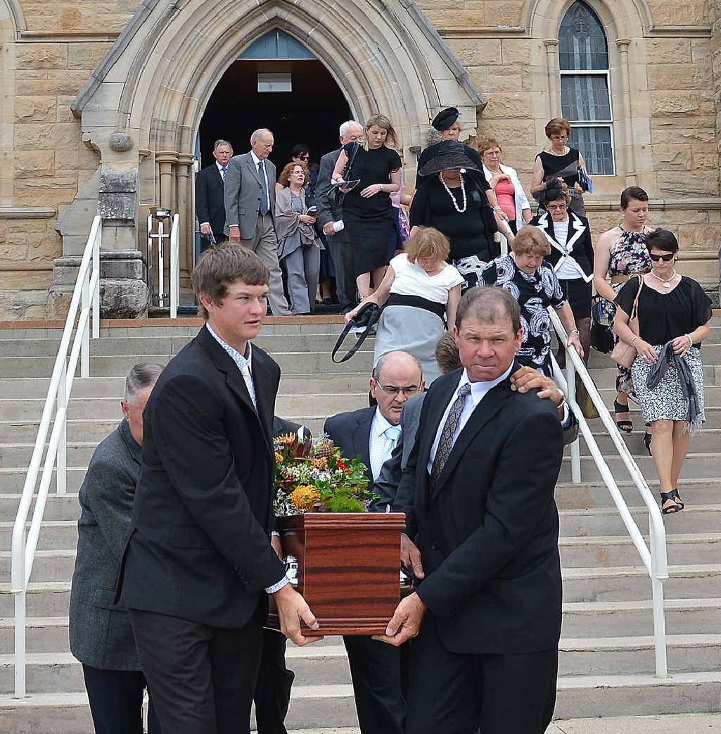 SAD DAY: Fabian Webb’s grandson and son lead the pall bearers as his casket is taken from St Patrick’s Catholic Church yesterday. SAD DAY: Fabian Webb’s grandson and son lead the pall bearers as his casket is taken from St Patrick’s Catholic Church yesterday.