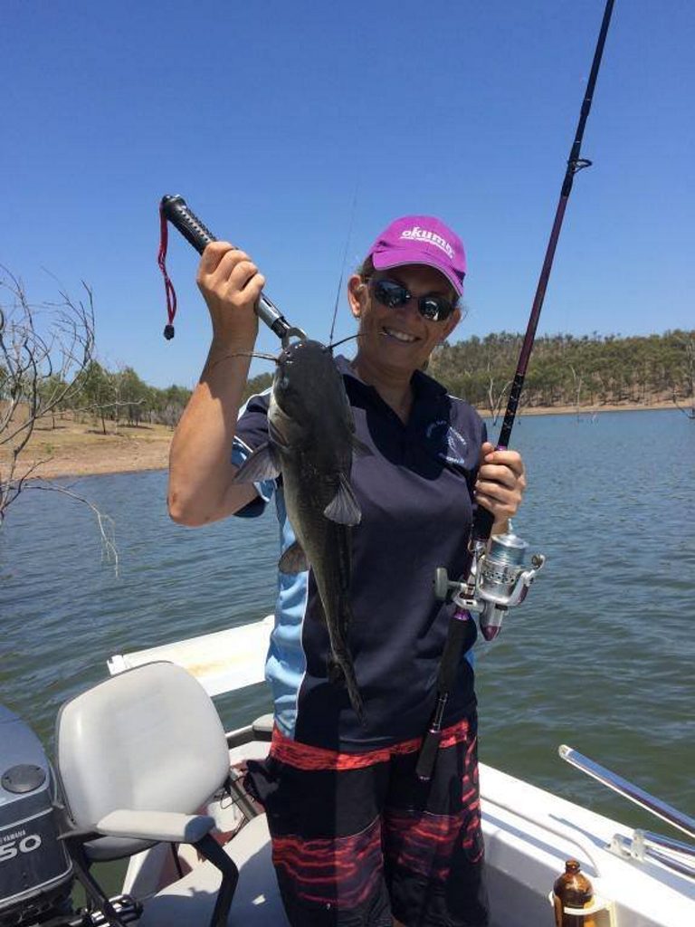 Sammie Carters with the prize winning catfish. Sammie Carters with the prize winning catfish.