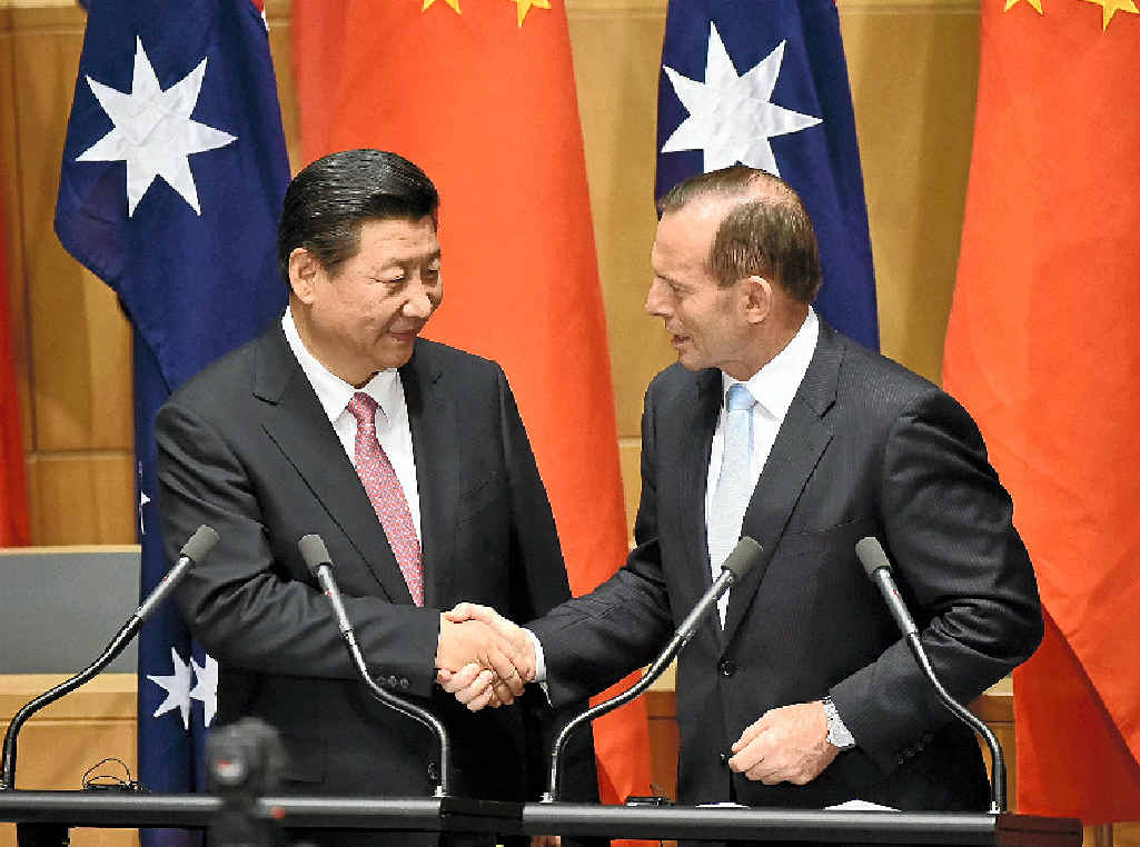 BIG NEWS: China’s President Xi Jinping shakes hands with Australia’s Prime Minister Tony Abbott after statements to the media following the signing of a free trade agreement at Parliament House on Monday. The trade deal is big news for Gympie region’s macadamia industry. BIG NEWS: China’s President Xi Jinping shakes hands with Australia’s Prime Minister Tony Abbott after statements to the media following the signing of a free trade agreement at Parliament House on Monday. The trade deal is big news for Gympie region’s macadamia industry.