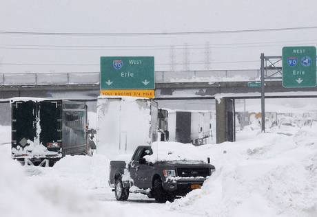 Vehicles litter the highway in West Seneca, New York Vehicles litter the highway in West Seneca, New York