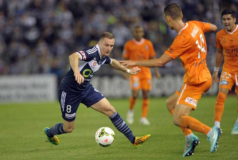 Besart Berisha (left) and Daniel Bowles contest for the ball during the Melbourne Victory versus Brisbane Roar A-League round seven match at Etihad Stadium in Melbourne, Friday, Nov. 21, 2014. Besart Berisha (left) and Daniel Bowles contest for the ball during the Melbourne Victory versus Brisbane Roar A-League round seven match at Etihad Stadium in Melbourne, Friday, Nov. 21, 2014.