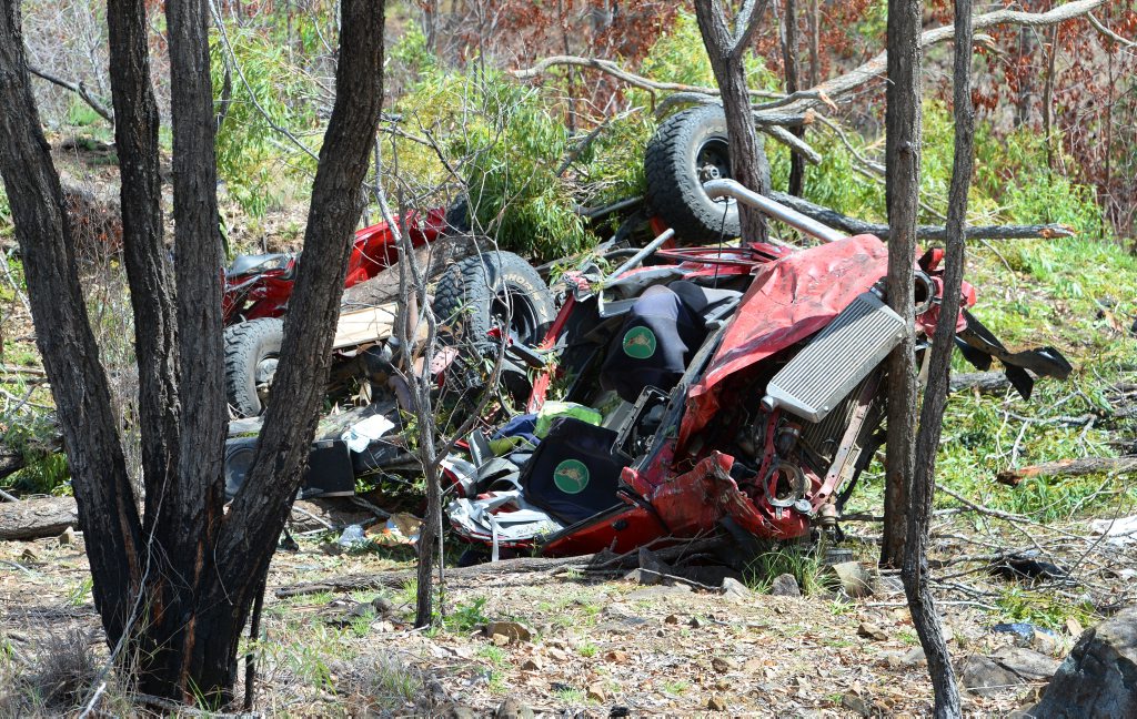 Wrecked car off the Burnett Highway at Struck Oil after it left the road and rolled down an embankment. Photo: Chris Ison / The Morning Bulletin Wrecked car off the Burnett Highway at Struck Oil after it left the road and rolled down an embankment. Photo: Chris Ison / The Morning Bulletin