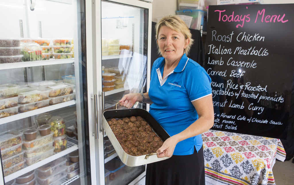 DISING IT UP: Lauren Argent of Yamba Catering with some of her meals. Photo: Adam Hourigan DISING IT UP: Lauren Argent of Yamba Catering with some of her meals. Photo: Adam Hourigan