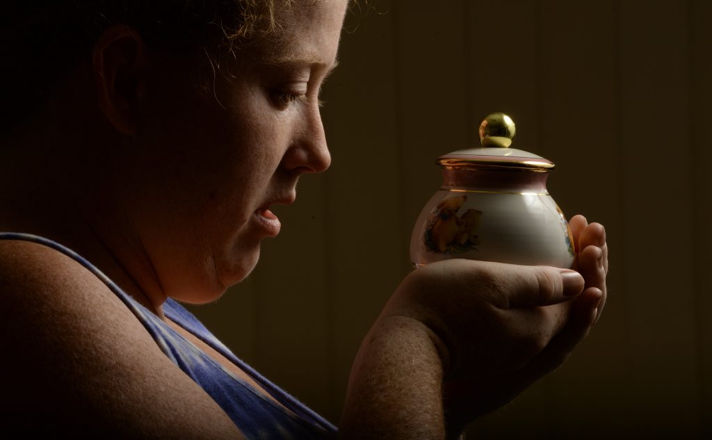 Rachelle Lind with the ashes of her daughter Caitlin who passed away after complications. A coroner's report into the death of the baby raises serious questions on the conduct of the staff at Ipswich Hospital. Rachelle Lind with the ashes of her daughter Caitlin who passed away after complications. A coroner's report into the death of the baby raises serious questions on the conduct of the staff at Ipswich Hospital.