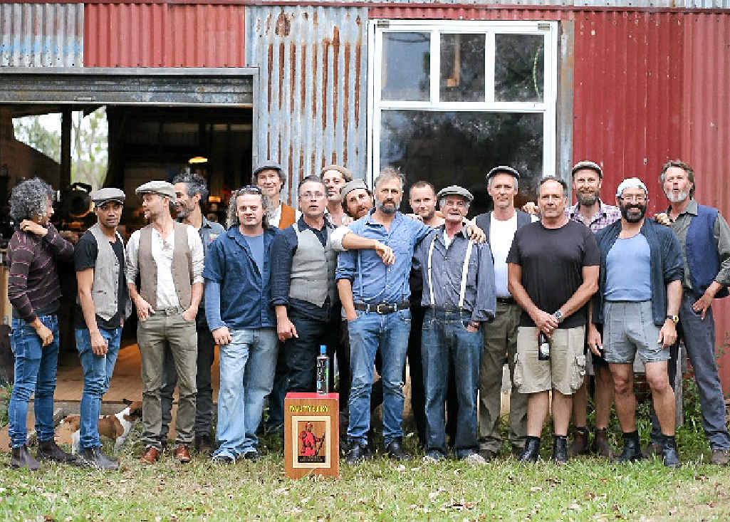 Andrew Swain (centre, in blue shirt) with most of the members of the Dustyesky Choir. Andrew Swain (centre, in blue shirt) with most of the members of the Dustyesky Choir.