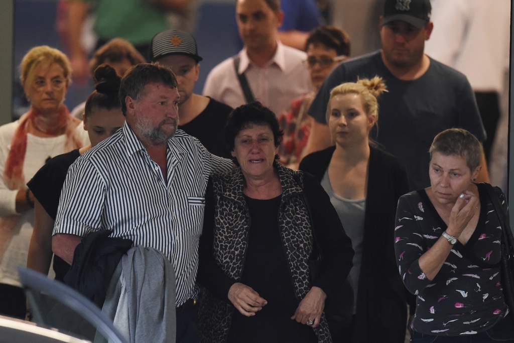 The parents of Phillip Hughes, father Greg and mother Virginia and family members leave St. Vincents Hospital in Sydney. (AAP Image/Dean Lewins) The parents of Phillip Hughes, father Greg and mother Virginia and family members leave St. Vincents Hospital in Sydney. (AAP Image/Dean Lewins)