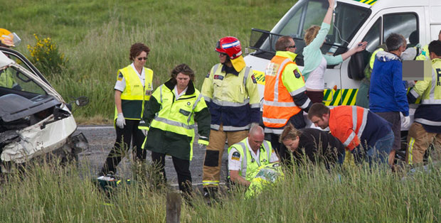 Emergency services staff tend to the injured. Emergency services staff tend to the injured.