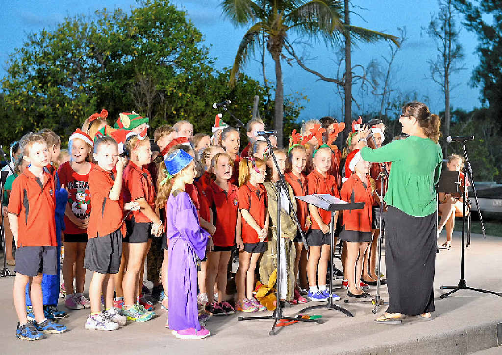Boyne Island State School choir singing to the crowd. Boyne Island State School choir singing to the crowd.
