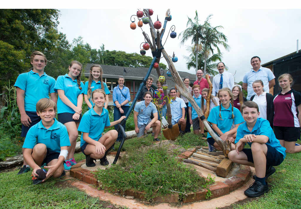 CREATIVE: Sawtell Public School students with one of the sculptures. Photo: TREVOR VEALE CREATIVE: Sawtell Public School students with one of the sculptures. Photo: TREVOR VEALE
