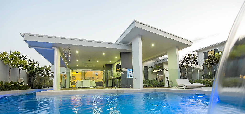 ELEGANT LIVING: The view from the in-ground pool into the house at Cormorant Cl that’s for sale for $1.99 million. ELEGANT LIVING: The view from the in-ground pool into the house at Cormorant Cl that’s for sale for $1.99 million.