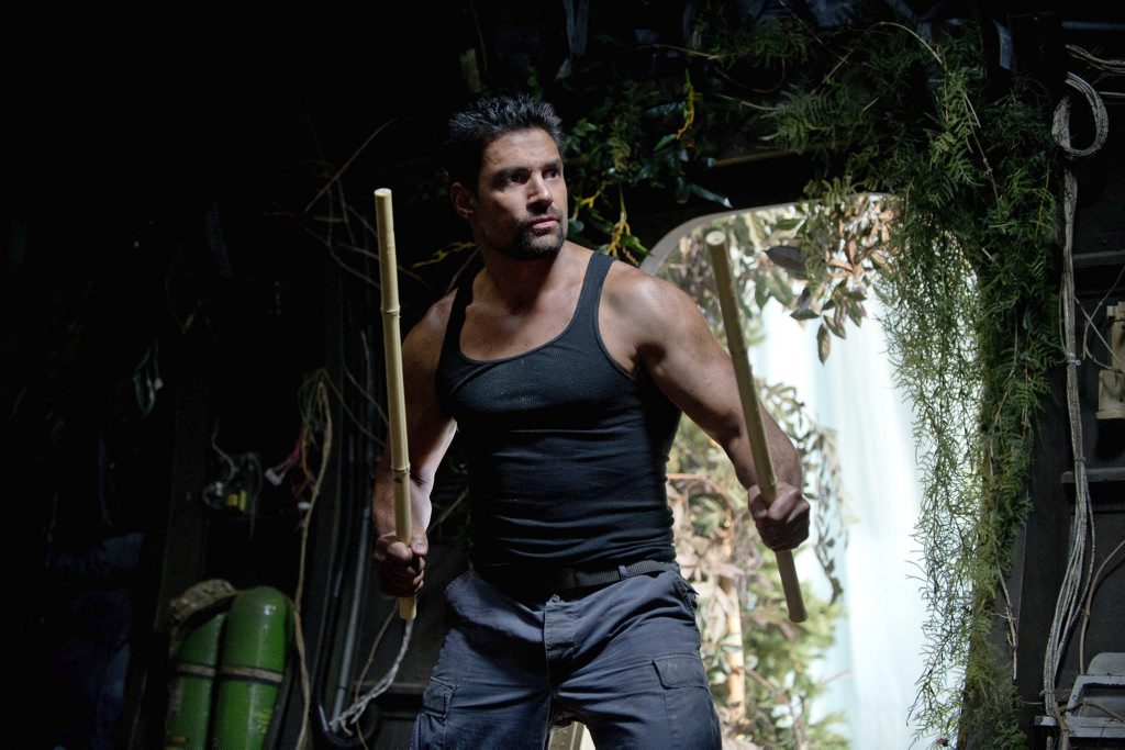Manu Bennett stars as Slade Wilson in the TV series Arrow. Manu Bennett stars as Slade Wilson in the TV series Arrow.