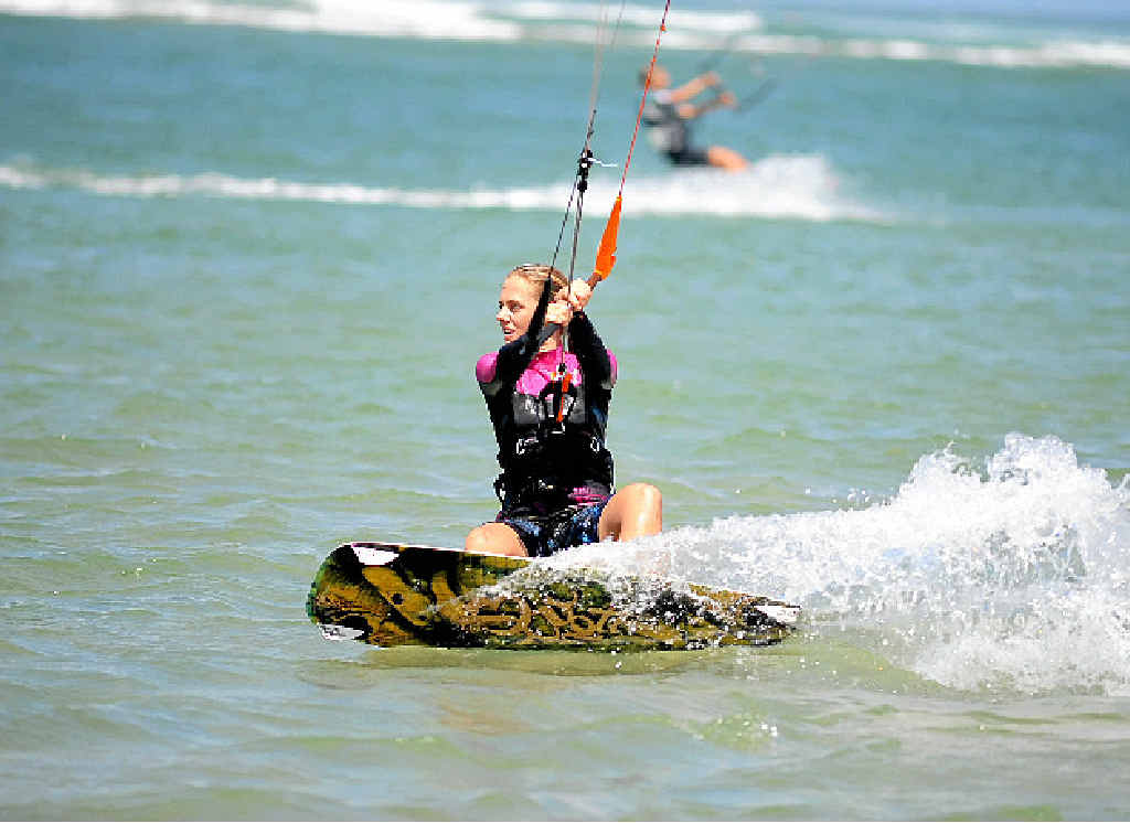 JOY RIDE: A kitesurfer makes the most of the conditions. JOY RIDE: A kitesurfer makes the most of the conditions.