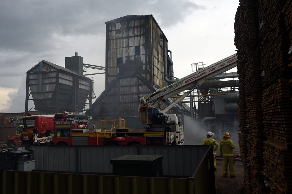 Fire crews battle a blaze at the Carter Holt Harvey sawmill on Henzell Rd on Tuesday, December 9, 2014. Fire crews battle a blaze at the Carter Holt Harvey sawmill on Henzell Rd on Tuesday, December 9, 2014.