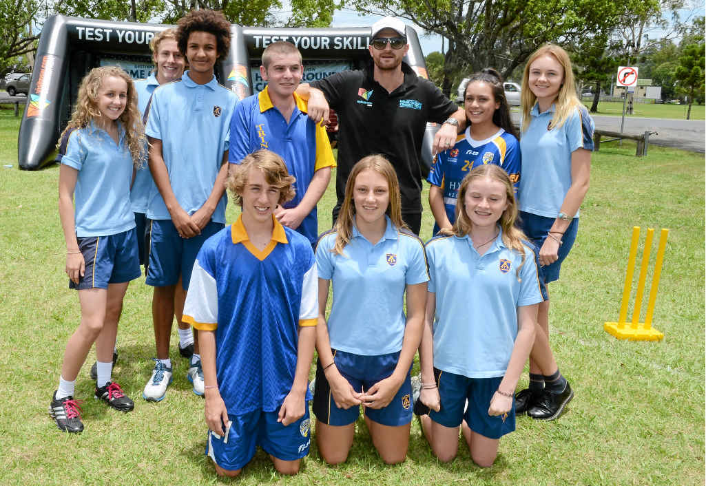Trinity Catholic College students with cricketer Jason Krezja at the NSW Home Ground Cricket Tour visit to Mortimer Oval, Lismore. Trinity Catholic College students with cricketer Jason Krezja at the NSW Home Ground Cricket Tour visit to Mortimer Oval, Lismore.