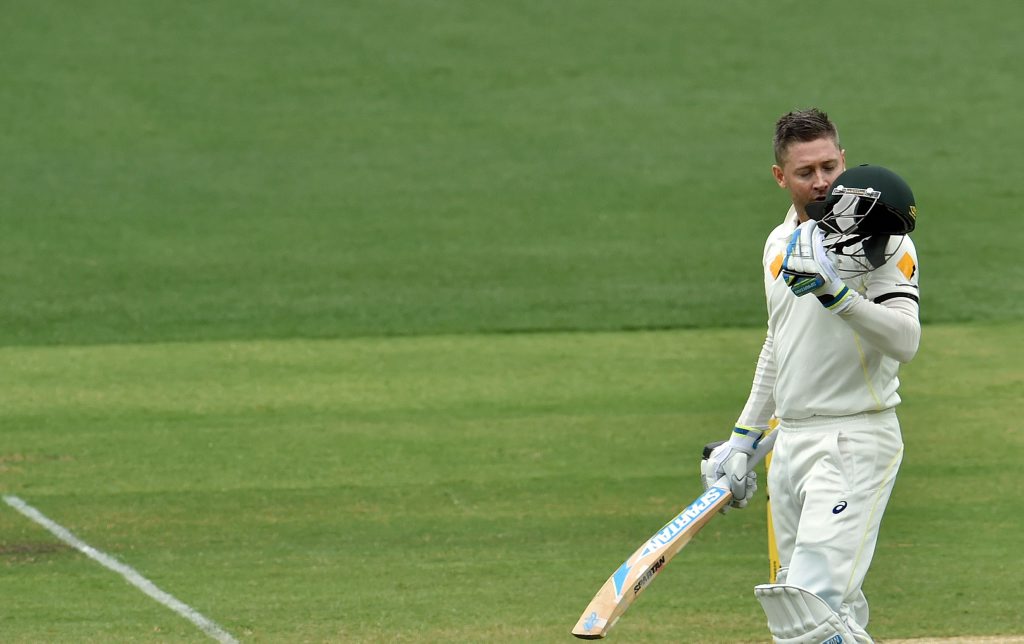 Australia's batsman Michael Clarke kisses his helmet as he celebrates his century on the second day of the first Test cricket match between Australia and India at the Adelaide Oval on December 10, 2014. AFP PHOTO / SAEED KHAN Australia's batsman Michael Clarke kisses his helmet as he celebrates his century on the second day of the first Test cricket match between Australia and India at the Adelaide Oval on December 10, 2014. AFP PHOTO / SAEED KHAN