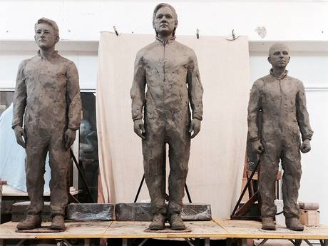 The statue of Julian Assange stands between sculptures of Edward Snowden, left, and Chelsea Manning The statue of Julian Assange stands between sculptures of Edward Snowden, left, and Chelsea Manning