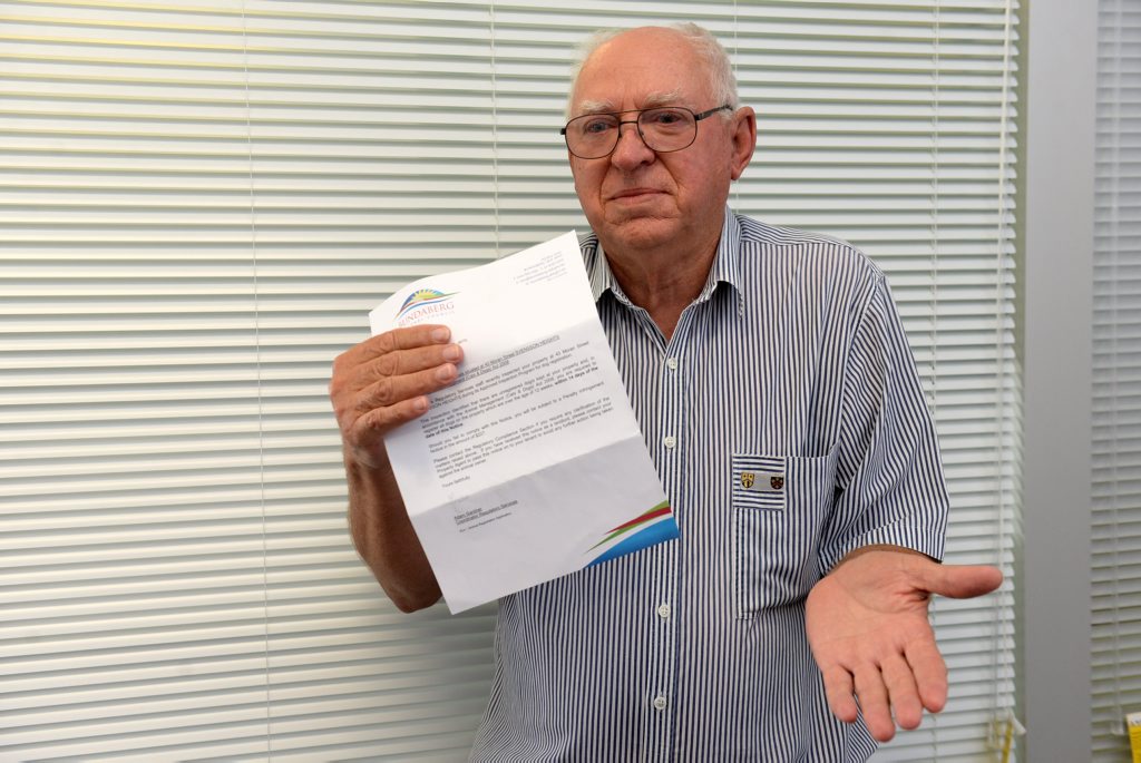 NO DOGS: Dennis Kington who does not own a dog received a notice from the council about unregistered dog/dogs on his property. Photo: Mike Knott / NewsMail NO DOGS: Dennis Kington who does not own a dog received a notice from the council about unregistered dog/dogs on his property. Photo: Mike Knott / NewsMail