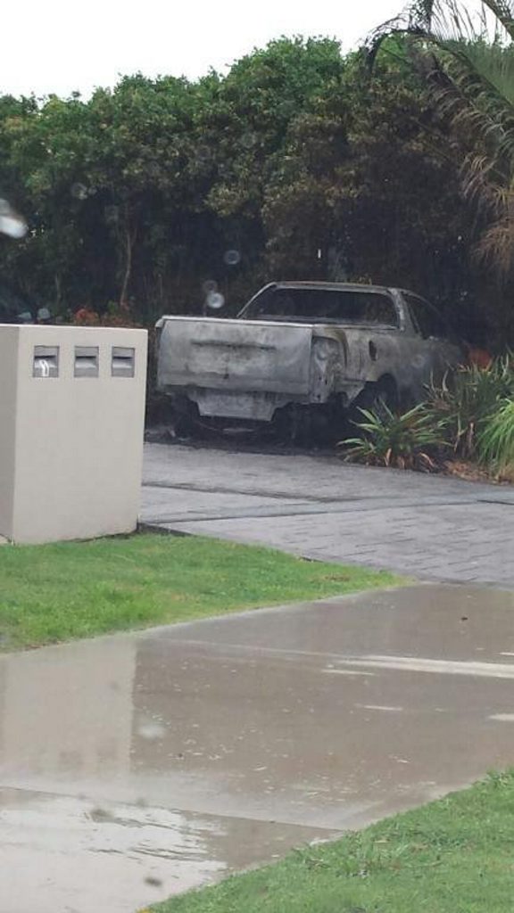 This orange ute parked at a unit block on Ibis Blvd at Eli Waters was gutted by fire in a suspected arson attack at 2am on Friday. This orange ute parked at a unit block on Ibis Blvd at Eli Waters was gutted by fire in a suspected arson attack at 2am on Friday.