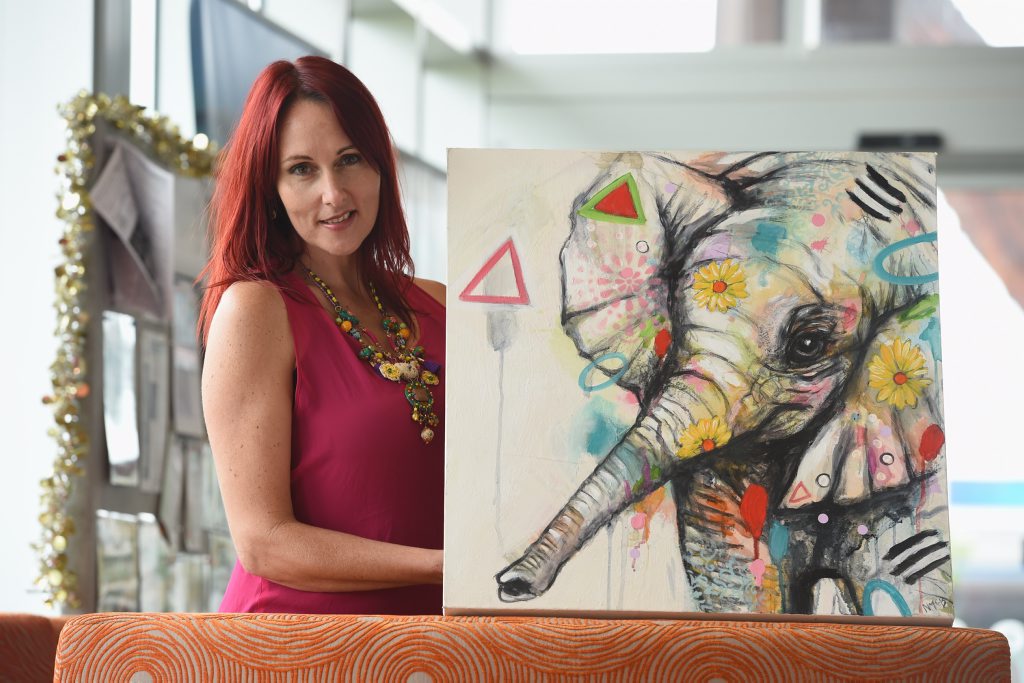 Nicole McBride with her painting Daisy that she is using to raise money for the Wide Bay animal refuge. Nicole McBride with her painting Daisy that she is using to raise money for the Wide Bay animal refuge.