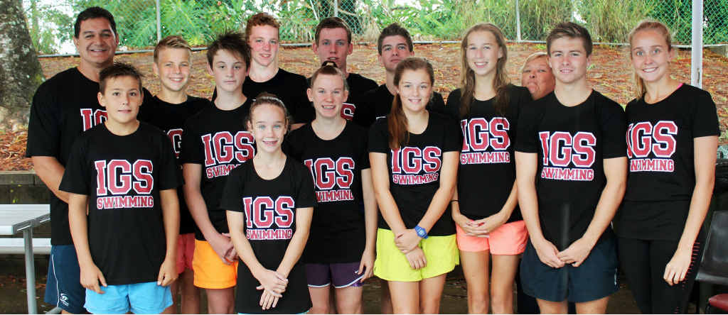 CLUB PRIDE: Members of the Ipswich Grammar swim team try on the shirts they received yesterday for qualifying for the state titles. CLUB PRIDE: Members of the Ipswich Grammar swim team try on the shirts they received yesterday for qualifying for the state titles.