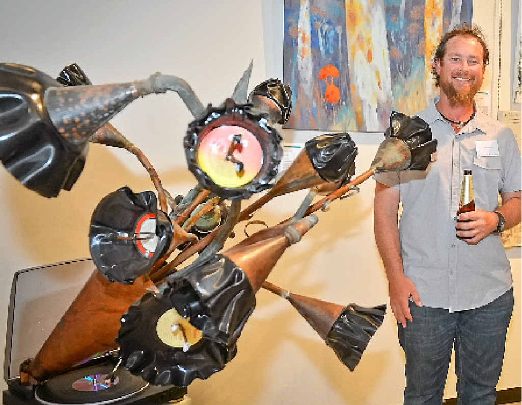 MUSIC REVISITED: Dan Carlyon with his three-dimensional work, What’s the Buzz. MUSIC REVISITED: Dan Carlyon with his three-dimensional work, What’s the Buzz.