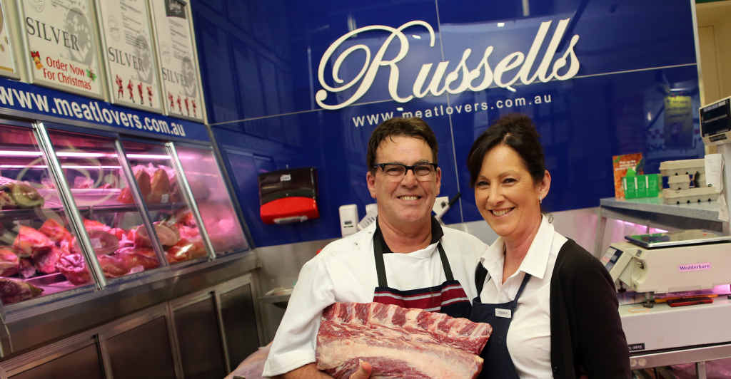 PADDOCK TO PLATE: Russell and Deborah Greenwood from Russell’s Prime Quality Meats, at Park Beach Plaza, with a standing rib cut of beef that was sourced locally. PADDOCK TO PLATE: Russell and Deborah Greenwood from Russell’s Prime Quality Meats, at Park Beach Plaza, with a standing rib cut of beef that was sourced locally.