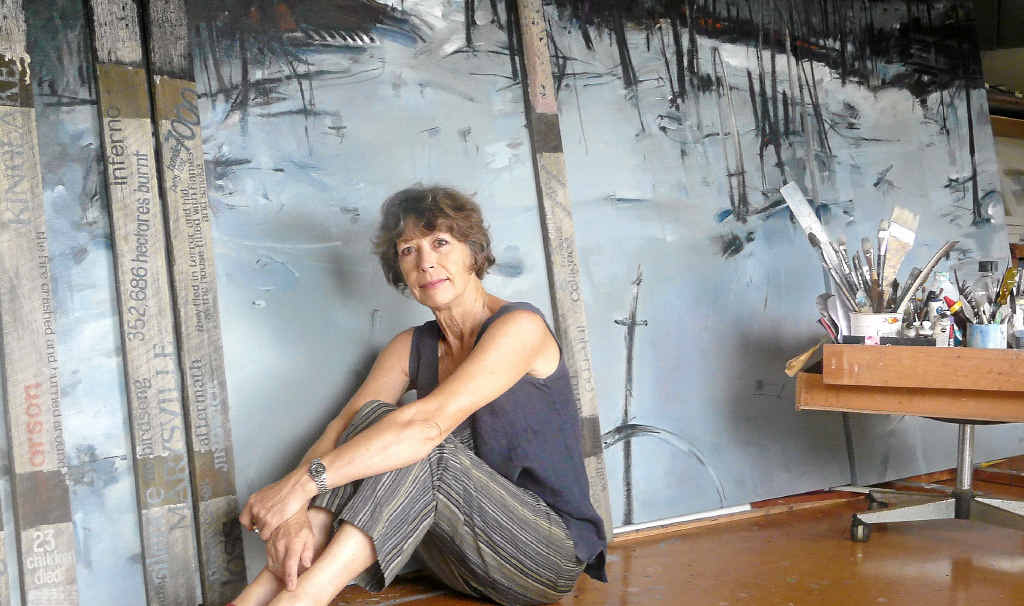PROLIFIC ARTIST : Artist Pam Walpole with art piece Black Saturday from a previous show PROLIFIC ARTIST : Artist Pam Walpole with art piece Black Saturday from a previous show