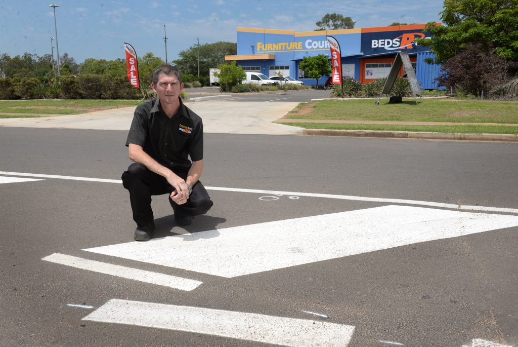 BEDS R US: Darren Scheuer feels that the new lines painted outside his Johanna Boulevard premises are a little too confusing for drivers trying to access the parking. Photo: Mike Knott / NewsMail BEDS R US: Darren Scheuer feels that the new lines painted outside his Johanna Boulevard premises are a little too confusing for drivers trying to access the parking. Photo: Mike Knott / NewsMail