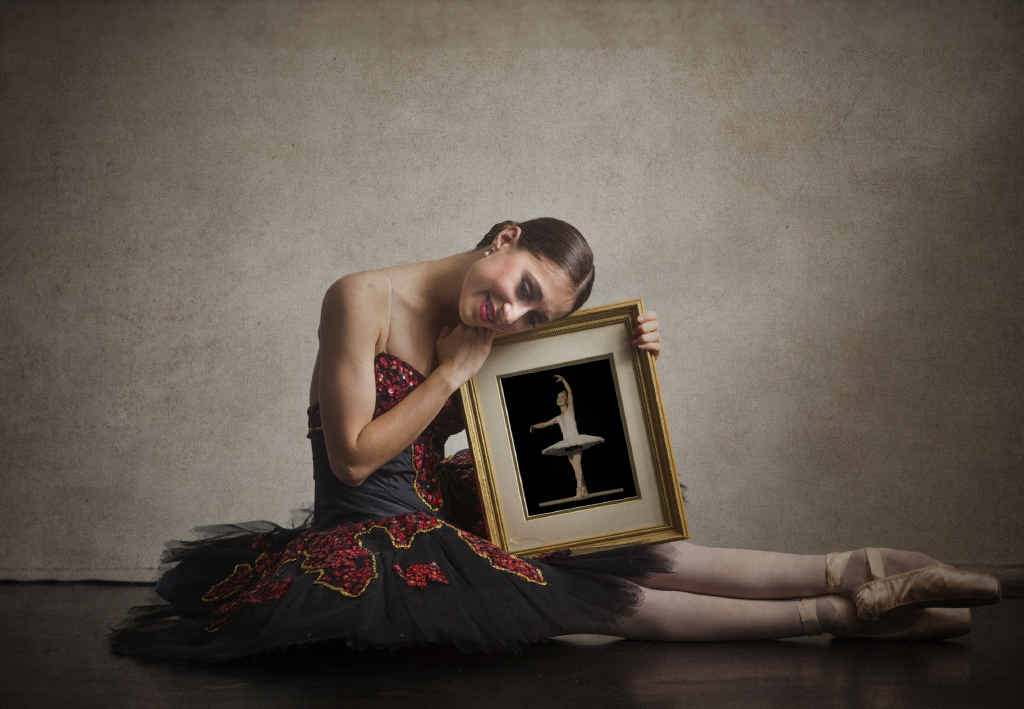 Lucy Ryder, 18, with a photo of one of her first dance performances reflects on her time with the Clarence River Dance Academy before starting full-time dance training next year with the National College of Dance. PHOTO: ADAM HOURIGAN Lucy Ryder, 18, with a photo of one of her first dance performances reflects on her time with the Clarence River Dance Academy before starting full-time dance training next year with the National College of Dance. PHOTO: ADAM HOURIGAN